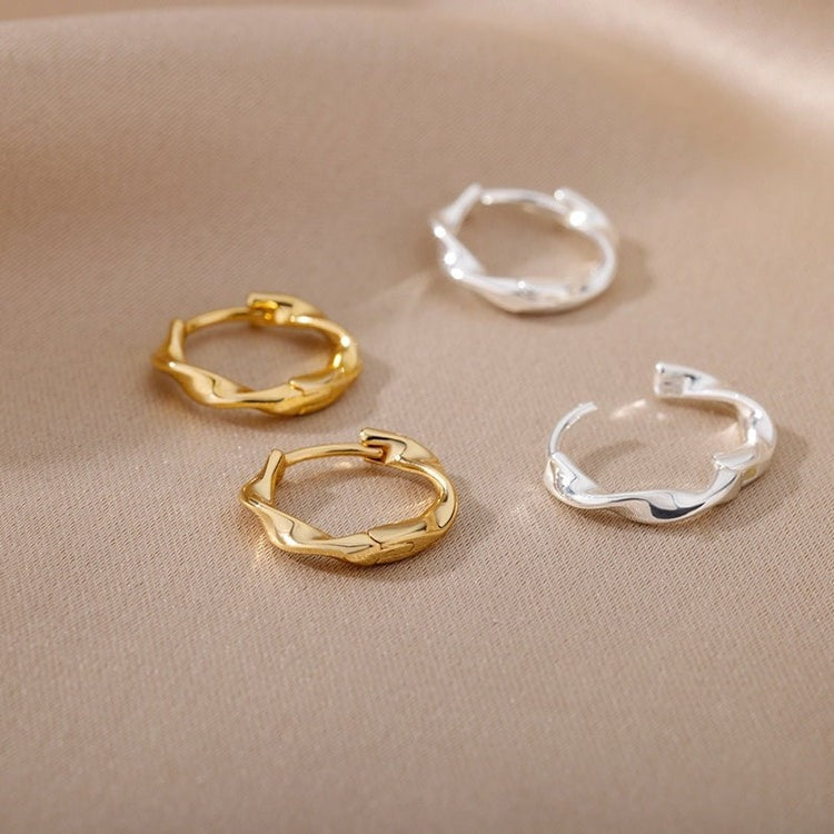 Elegance in Motion: Jacques Eclat's Dainty Twisted Hoops for Women