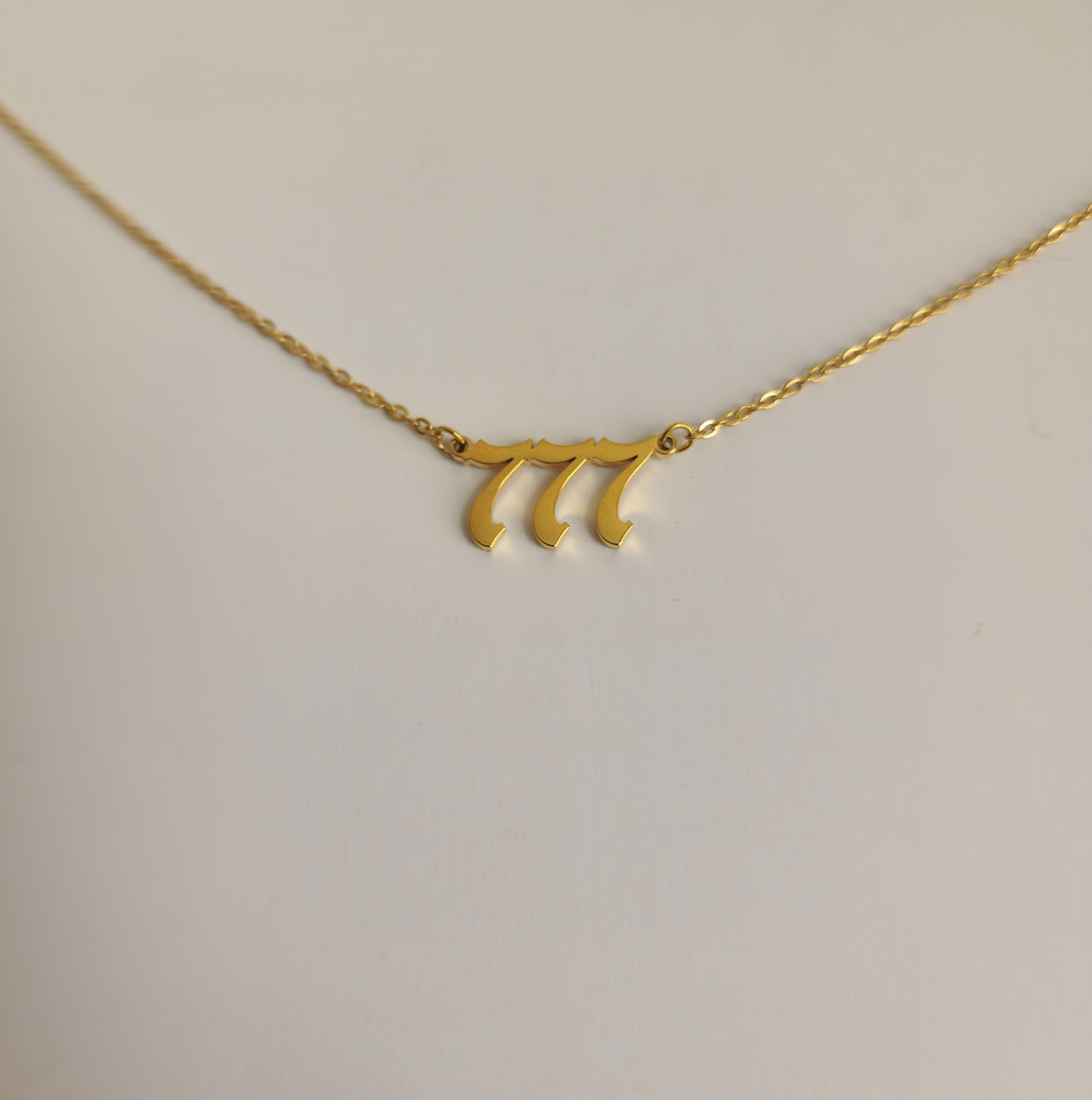 Gold 777 Necklace