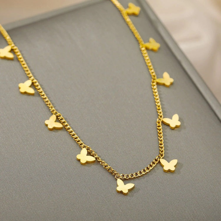 Whimsical Elegance: Flutter Into Style with Our Dainty Gold Butterfly Choker Necklace Collection