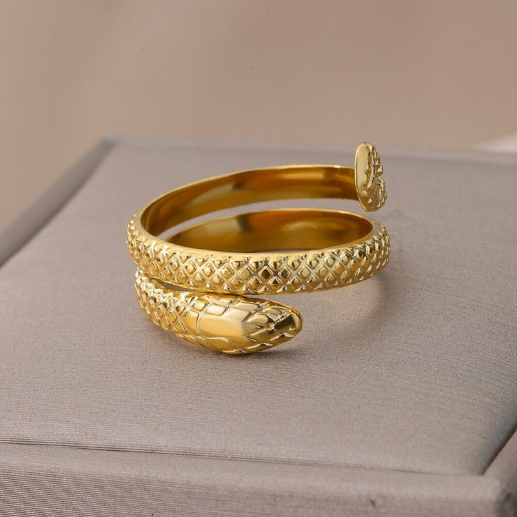 Serpentine Elegance: Jacques Eclat's Gold Snake Wrap Ring