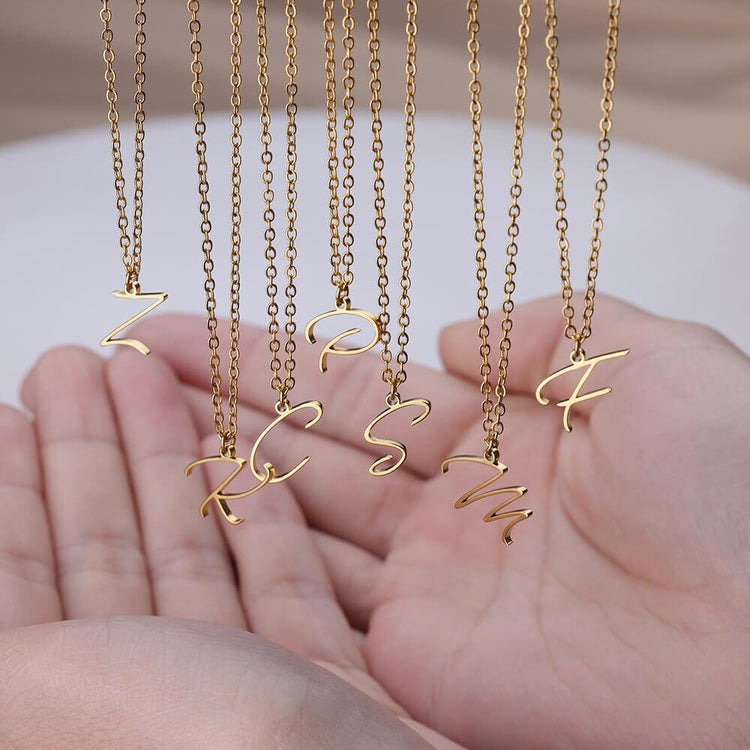 Whispers of Elegance: Embrace Simplicity with Our Gold Dainty Initials Pendant Collection