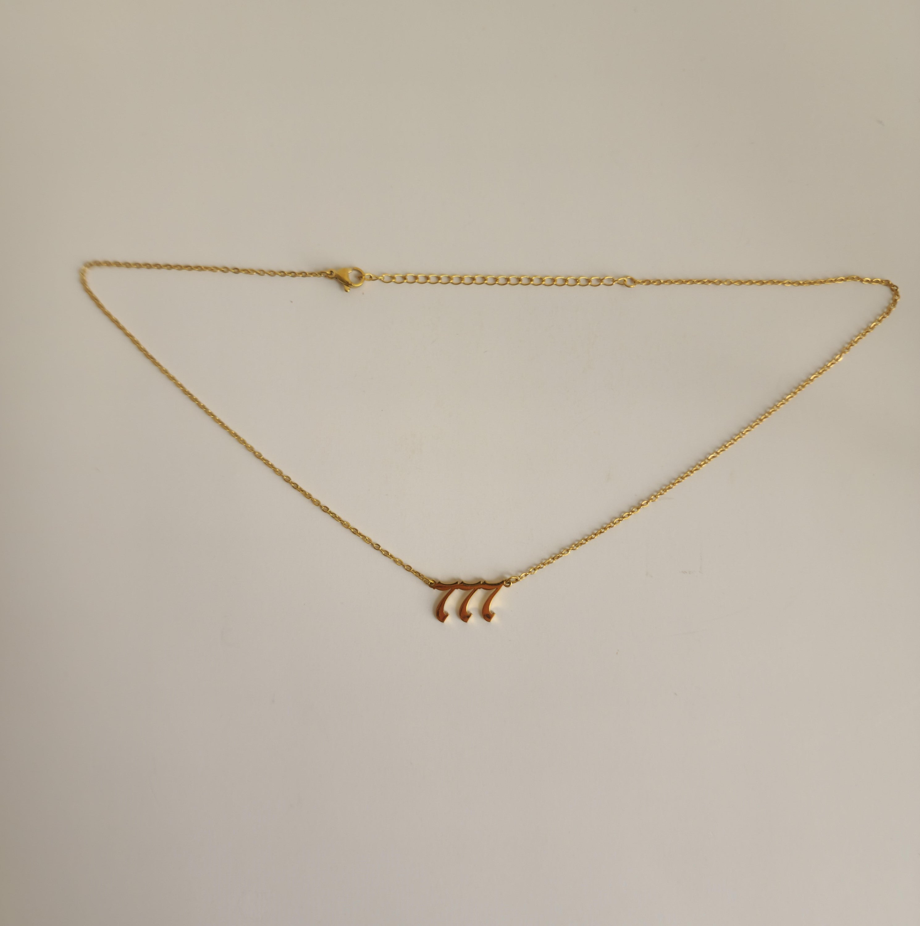 Gold 777 Necklace