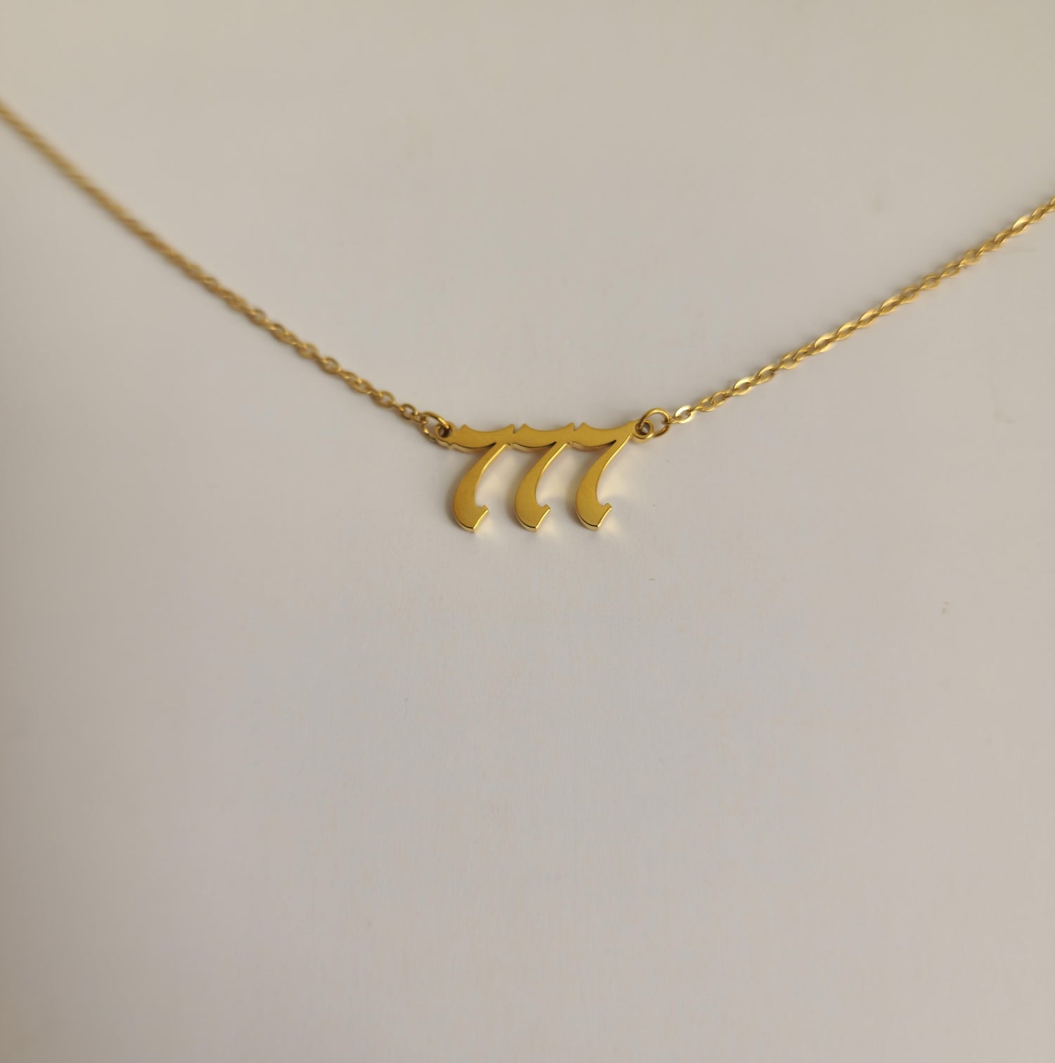 Gold 777 Necklace