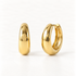 A pair of 18k gold bold dome huggie hoop earrings with thick polished rounded profile, shown from front and side angles on a clean white background displaying the substantial smooth reflective surface and hinged closure.