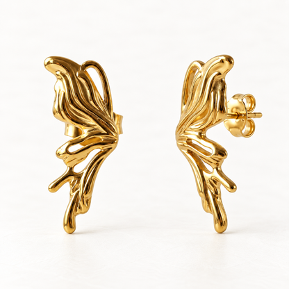 A pair of 18k gold butterfly wing stud earrings with detailed vein texture and organic shape, shown from front and side angles on a clean white background displaying the sculptural wing detail and post with butterfly backing.