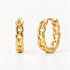 A pair of 18k gold chain-link huggie hoop earrings with interlocking oval chain pattern, shown from front and side angles on a clean white background displaying the detailed link texture and hinged closure.