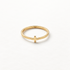 A gold cross ring with simple thin band and small centered cross symbol, delicate religious design with smooth polished surface, shown from front and side angles on a clean white background displaying the minimal spiritual symbolism, sleek band, and polished gold finish.