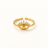 A gold evil eye ring with detailed eyelashes, curved brow, and central spherical pupil, open adjustable band, shown from front and side angles on a clean white background displaying the protective symbol design, intricate lash detail, and polished gold finish.