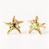 A pair of 18k gold starfish-shaped stud earrings with green peridot and pink tourmaline gemstones, shown from front and side angles on a clean white background displaying the colorful sea-inspired stone detail and post with butterfly backing.