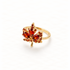 A gold maple leaf ring with amber orange citrine stones set in detailed leaf formation, autumn-inspired design with veined texture, open adjustable band, shown from front and side angles on a clean white background displaying the warm fall hues, intricate stone setting, and polished gold finish.