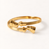 A gold Nefertiti collar bracelet with detailed Egyptian-inspired ribbed texture and ornate cylindrical end caps, shown from front and side angles on a clean white background displaying the open cuff design, regal queen silhouette shape, and intricate end detail.
