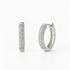 A pair of sterling silver pave huggie hoop earrings with clear crystals set along the front half, shown from front and side angles on a clean white background displaying the sparkling stone detail and hinged closure.
