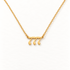 A gold 777 angel number necklace with stylized lucky numeral pendant and delicate cable chain, spiritual synchronicity design with textured surface, shown from front and side angles on a clean white background displaying the bold number detail, meaningful symbolism, and polished gold finish.