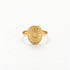 A gold sun coin filigree ring with intricate radiating pattern and smooth polished center, detailed metalwork sunburst design, open adjustable band, shown from front and side angles on a clean white background displaying the ornate celestial symbolism, delicate ray texture, and polished gold finish.