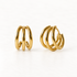 A pair of 18k gold triple band huggie hoop earrings with three parallel polished bands creating a stacked layered look, shown from front and side angles on a clean white background displaying the sculptural multi-band detail and hinged closure.